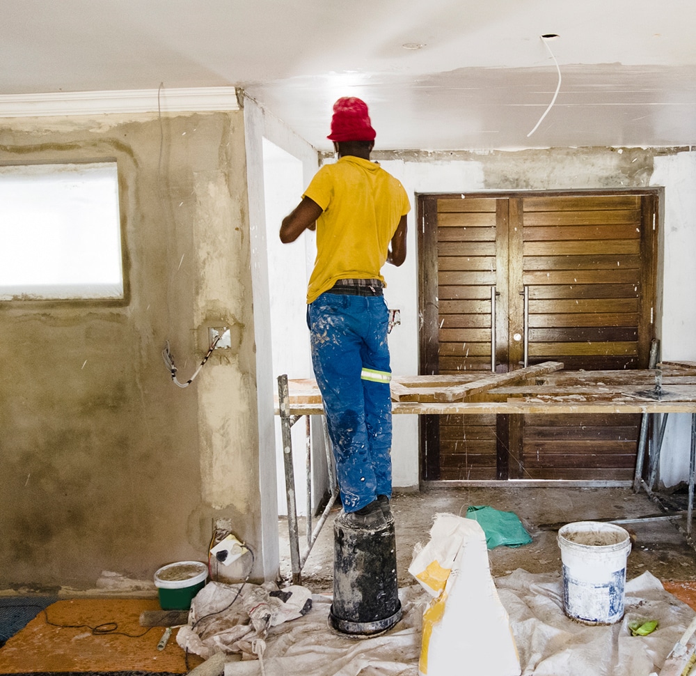 a person standing in a kitchen