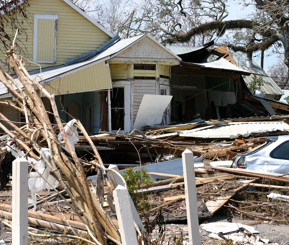 a pile of dirt in front of a house